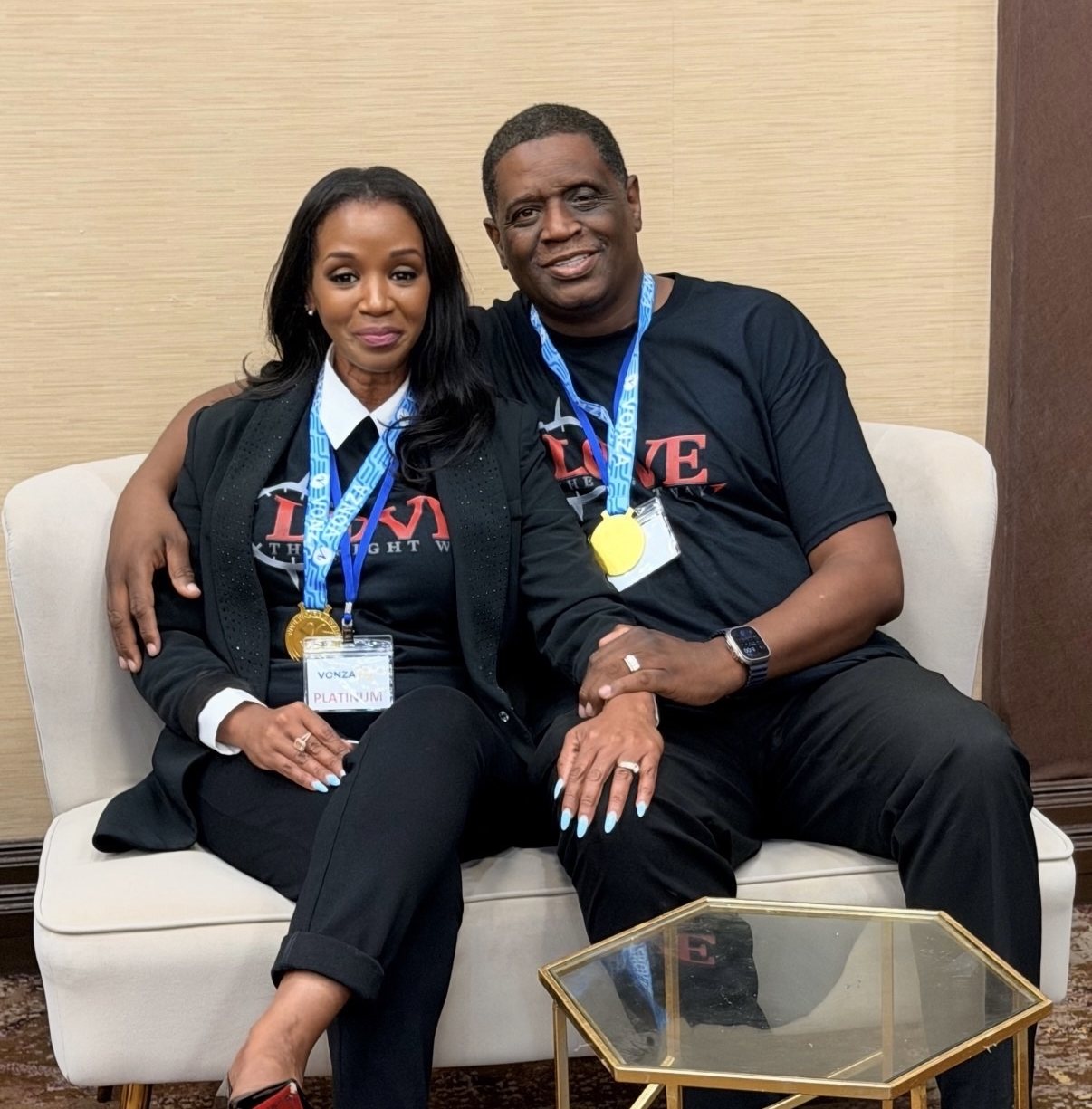 Drs. Kendrick and Tammy Meredith sitting together in Love The Right Way shirts